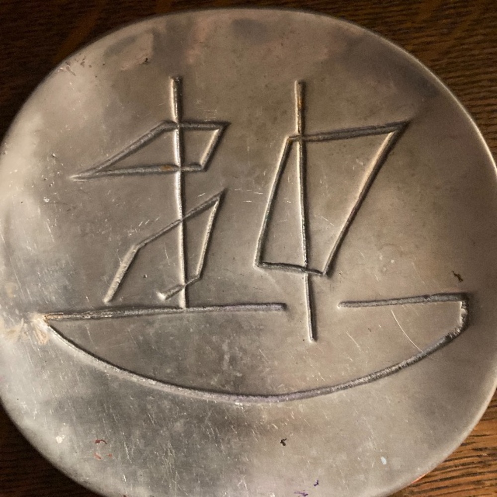 Weird silver disk